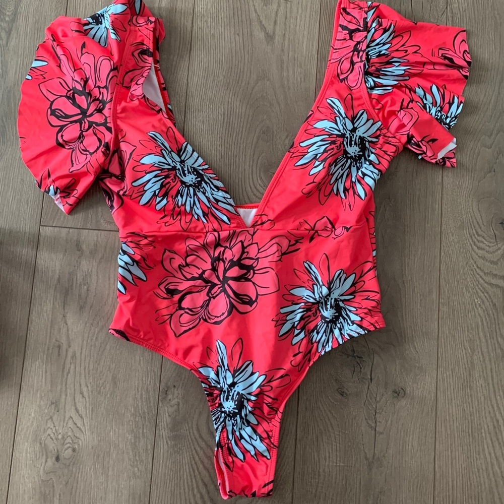TeLaura deep neck line one piece swimsuit